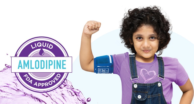 Girl in purple shirt and overalls flexes her bicep with a blood pressure monitor on her arm
